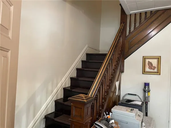 a view of entryway with wooden floor