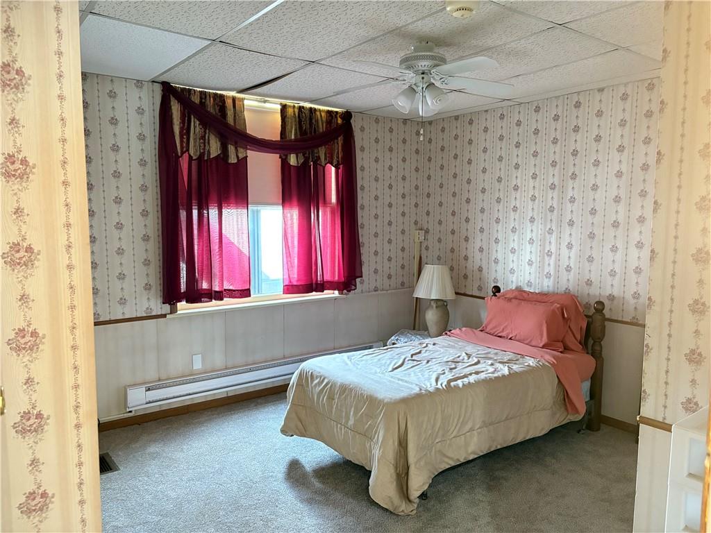 3884 East Street Pittsburgh, PA 15214 - Photo 46 of 49 a bedroom with a bed and a window