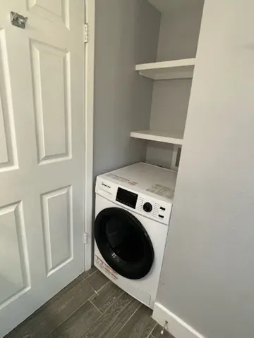 a utility room with dryer and washer