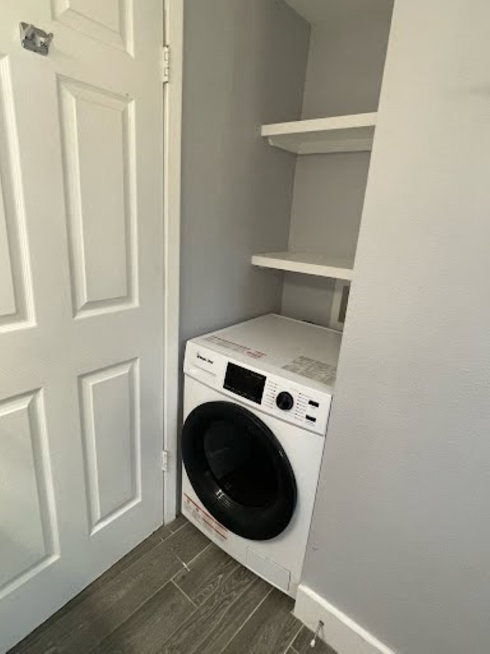2504 Manor Circle, Unit A Austin, TX 78723 - Photo 14 of 17 a utility room with dryer and washer