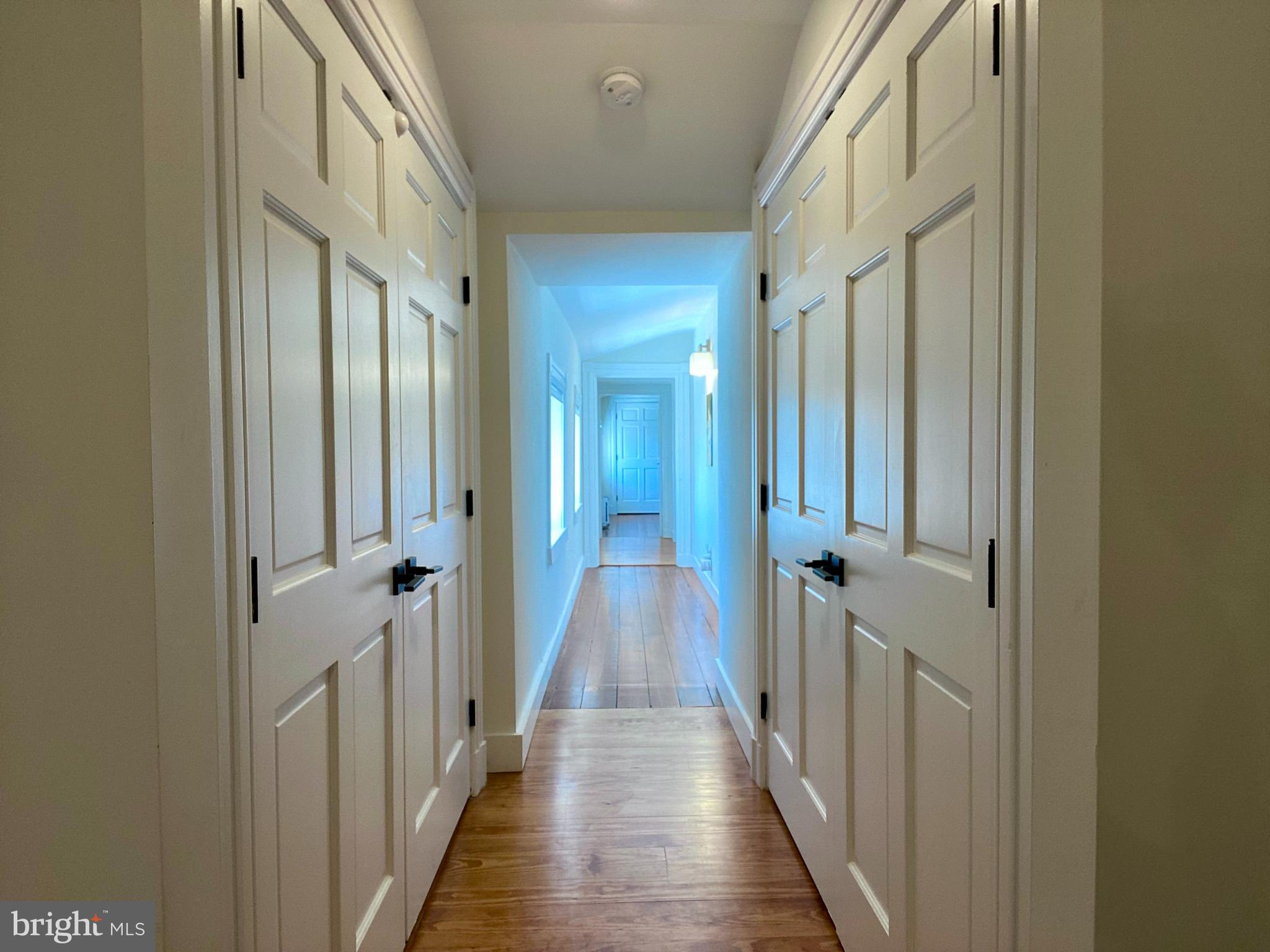 121 Upnor Road Baltimore, MD 21212 - Photo 57 of 79 a view of a hallway with wooden floor