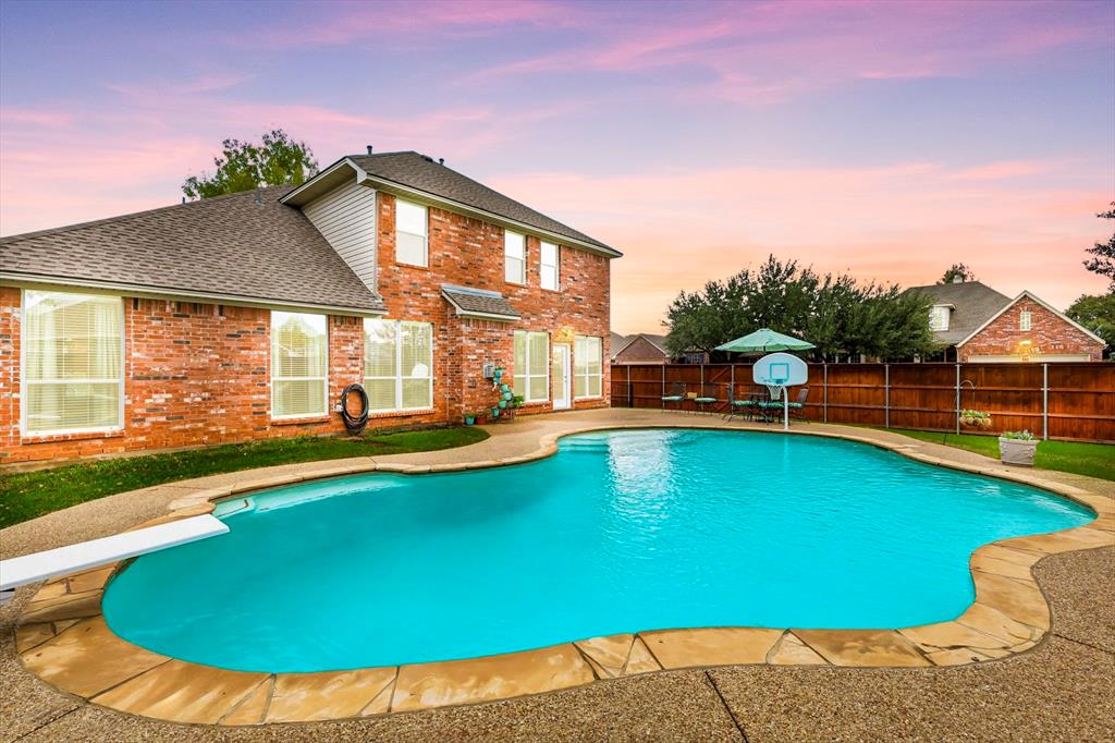 2321 Bear Run Road Arlington, TX 76001 - Photo 27 of 34 a view of a house with swimming pool