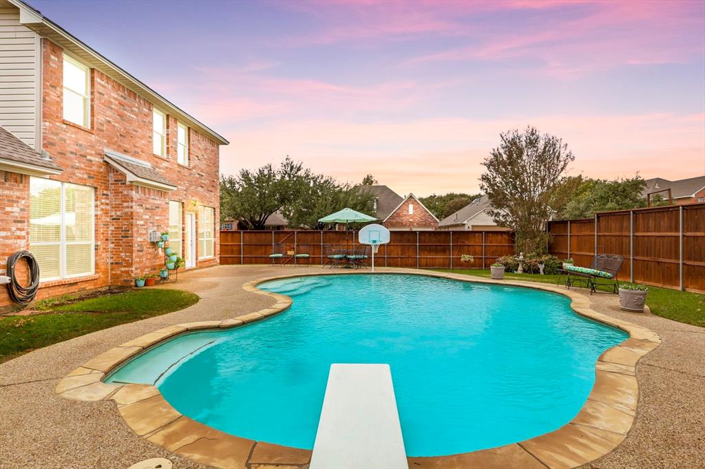 2321 Bear Run Road Arlington, TX 76001 - Photo 28 of 34 a view of a swimming pool with lounge chair