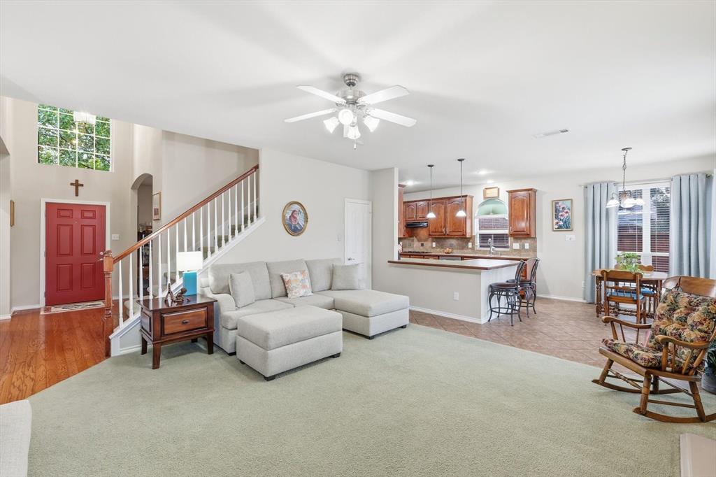 2321 Bear Run Road Arlington, TX 76001 - Photo 5 of 34 a living room with furniture and a flat screen tv