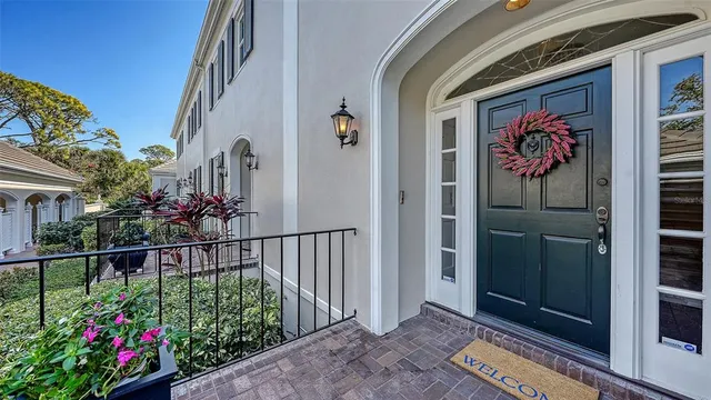 a view of an entryway with a flower pot