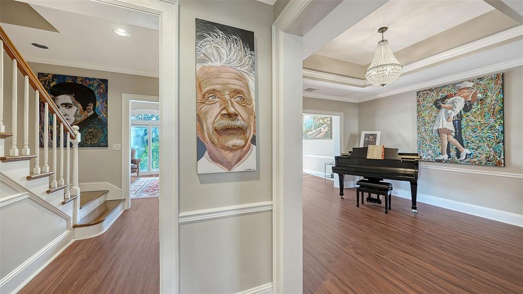 57 Bishopscourt Road, Unit 121 Osprey, FL 34229 - Photo 6 of 86 a kitchen with stainless steel appliances granite countertop a refrigerator and a stove top oven