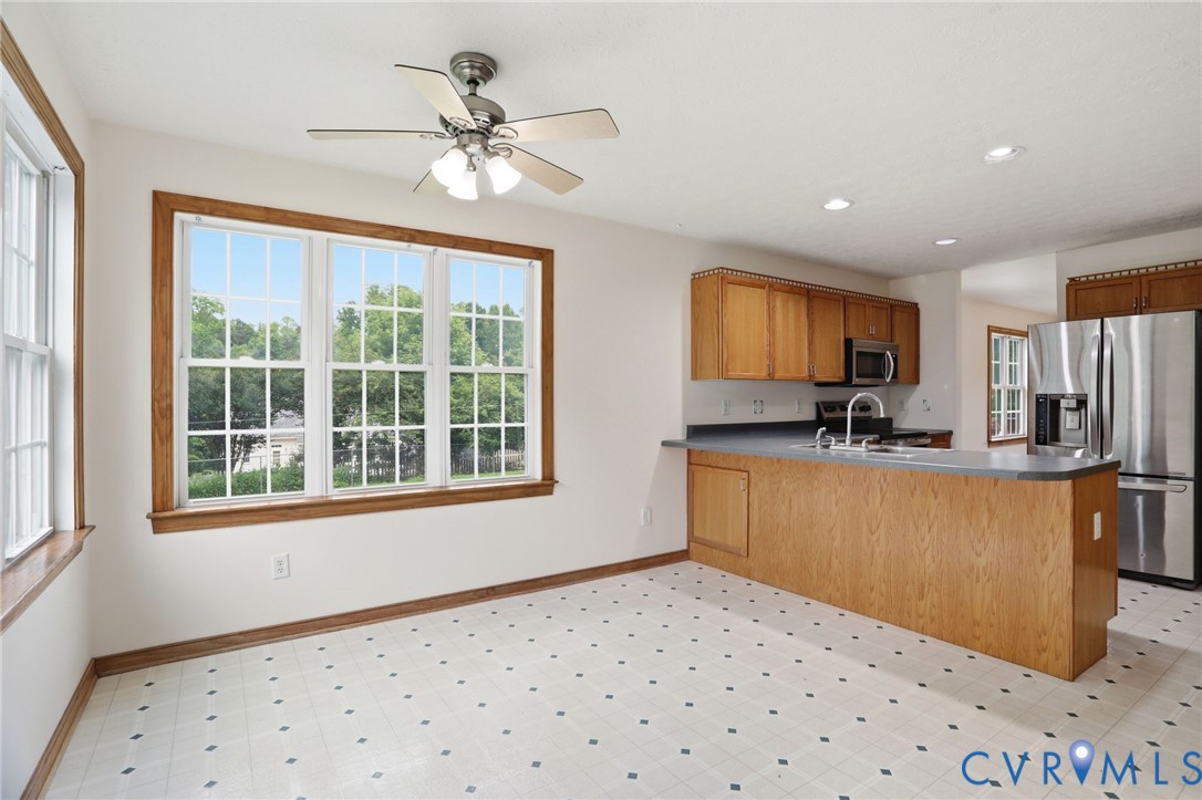 14420 Branding Iron Road Chesterfield, VA 23838 - Photo 15 of 50 Eat-in kitchen featuring a multi-pane window, oak