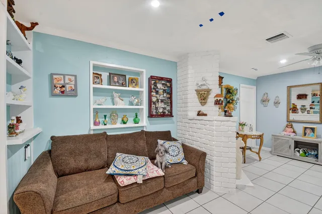 a outdoor dining space with furniture and toys