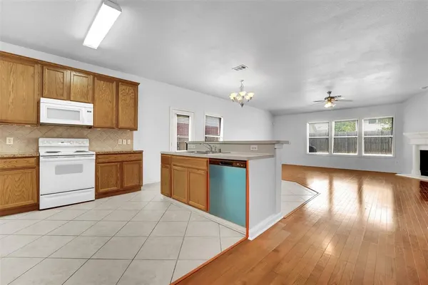 a view of a backyard with a garden