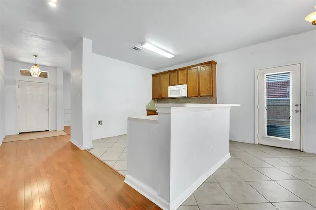 a view of a storage & utility room with washer and dryer