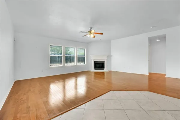 a kitchen with stainless steel appliances a sink stove and cabinets