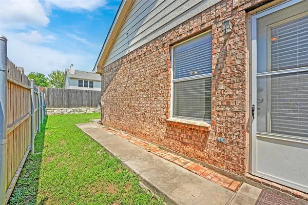 a bathroom with a bathtub and a sink