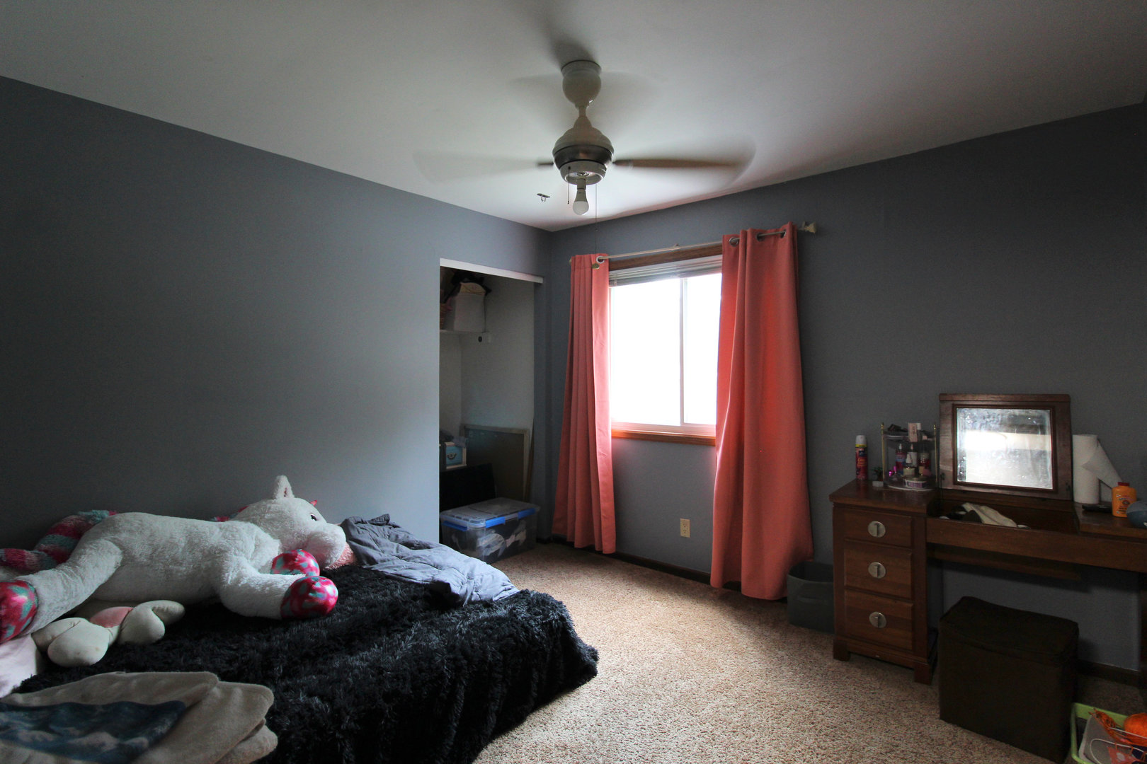 32 Emery Drive Bourbonnais, IL 60914 - Photo 12 of 17 a bedroom with bed and a chandelier