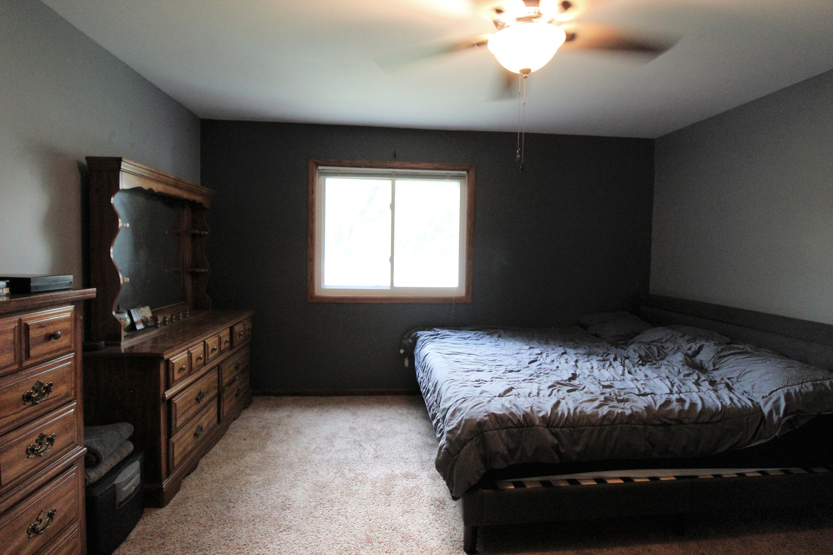 32 Emery Drive Bourbonnais, IL 60914 - Photo 15 of 17 a bedroom with a bed and a flat screen tv