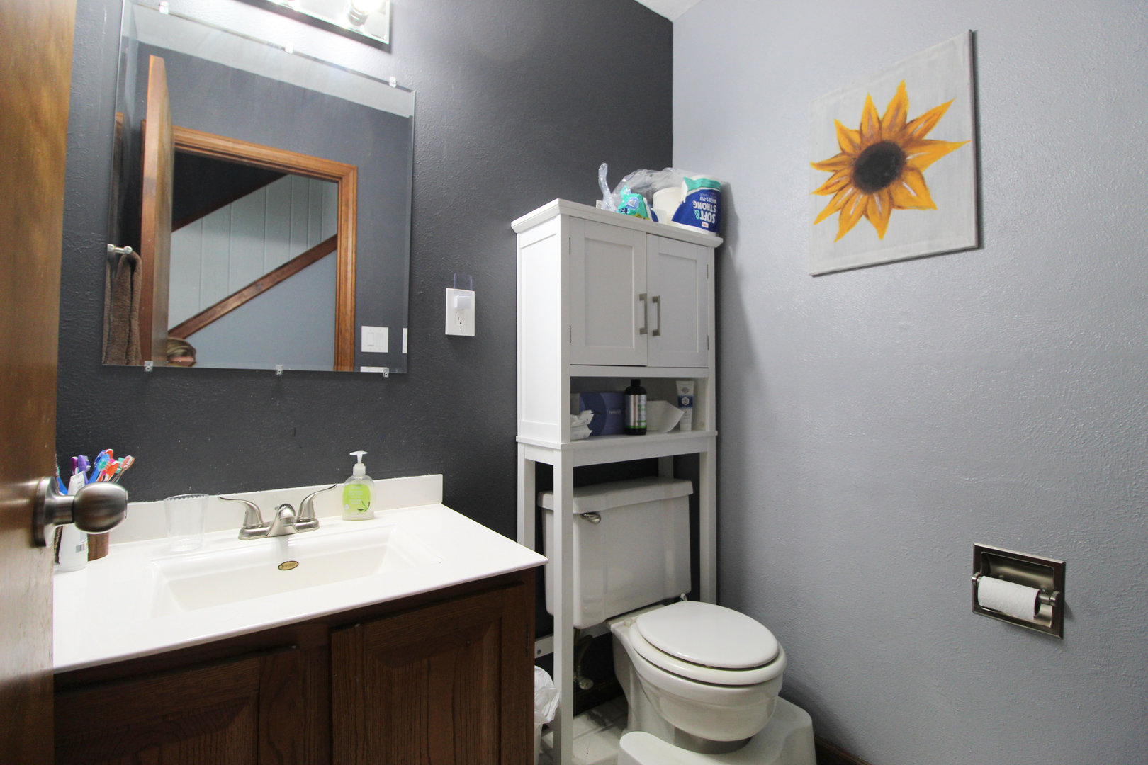 32 Emery Drive Bourbonnais, IL 60914 - Photo 16 of 17 a bathroom with a toilet sink and mirror