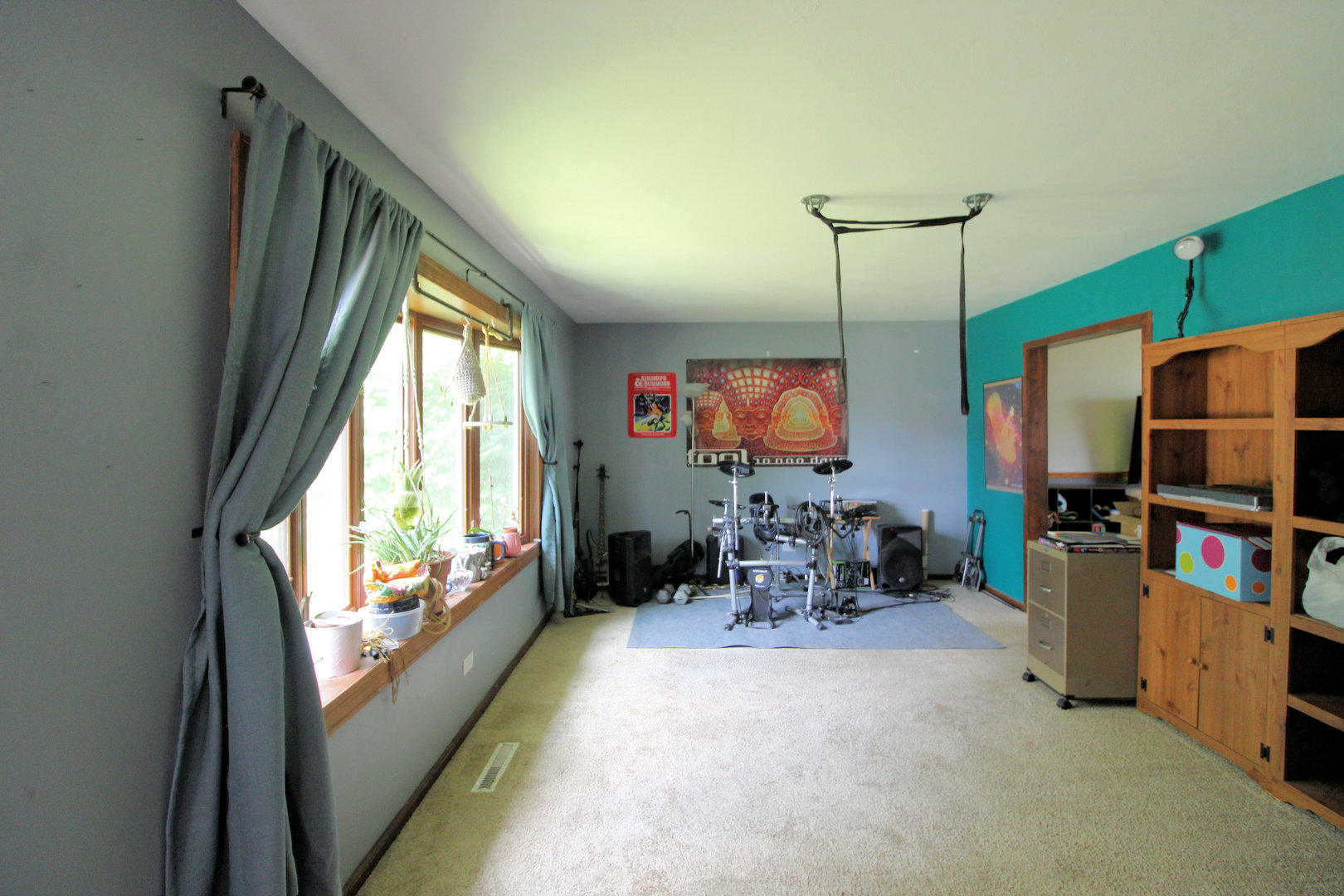 32 Emery Drive Bourbonnais, IL 60914 - Photo 4 of 17 a dining room with furniture and a flat screen tv