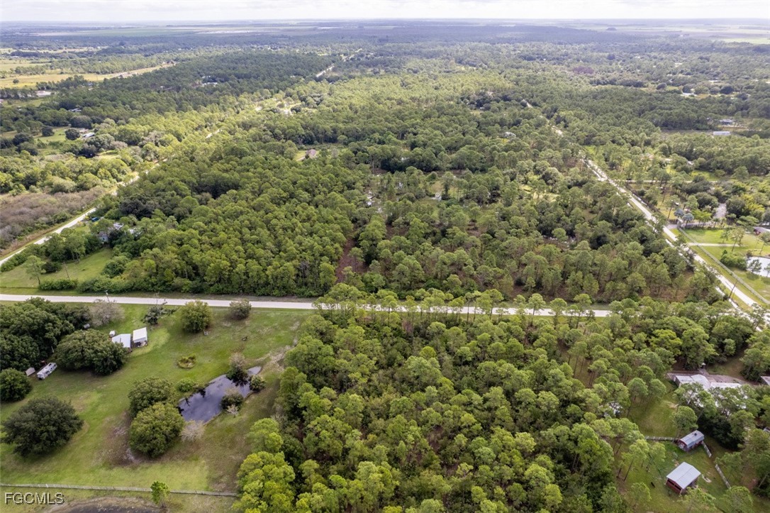 2201 Riviera Avenue Clewiston, FL 33440 - Photo 23 of 31 an aerial view of a houses with a yard