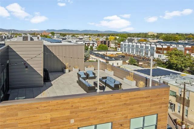 a view of a balcony with city view