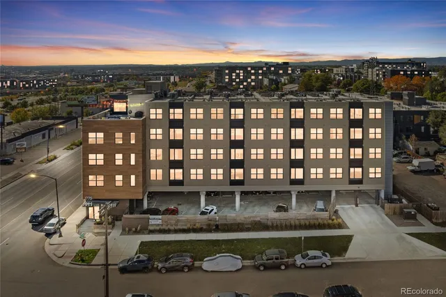 a terrace with a table and chairs