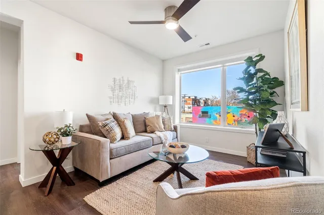 a living room with furniture and a couch