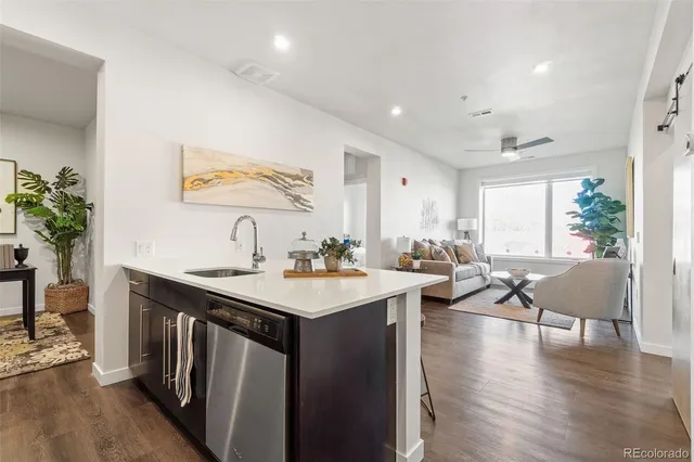 a view of a room that has a table and chairs in it
