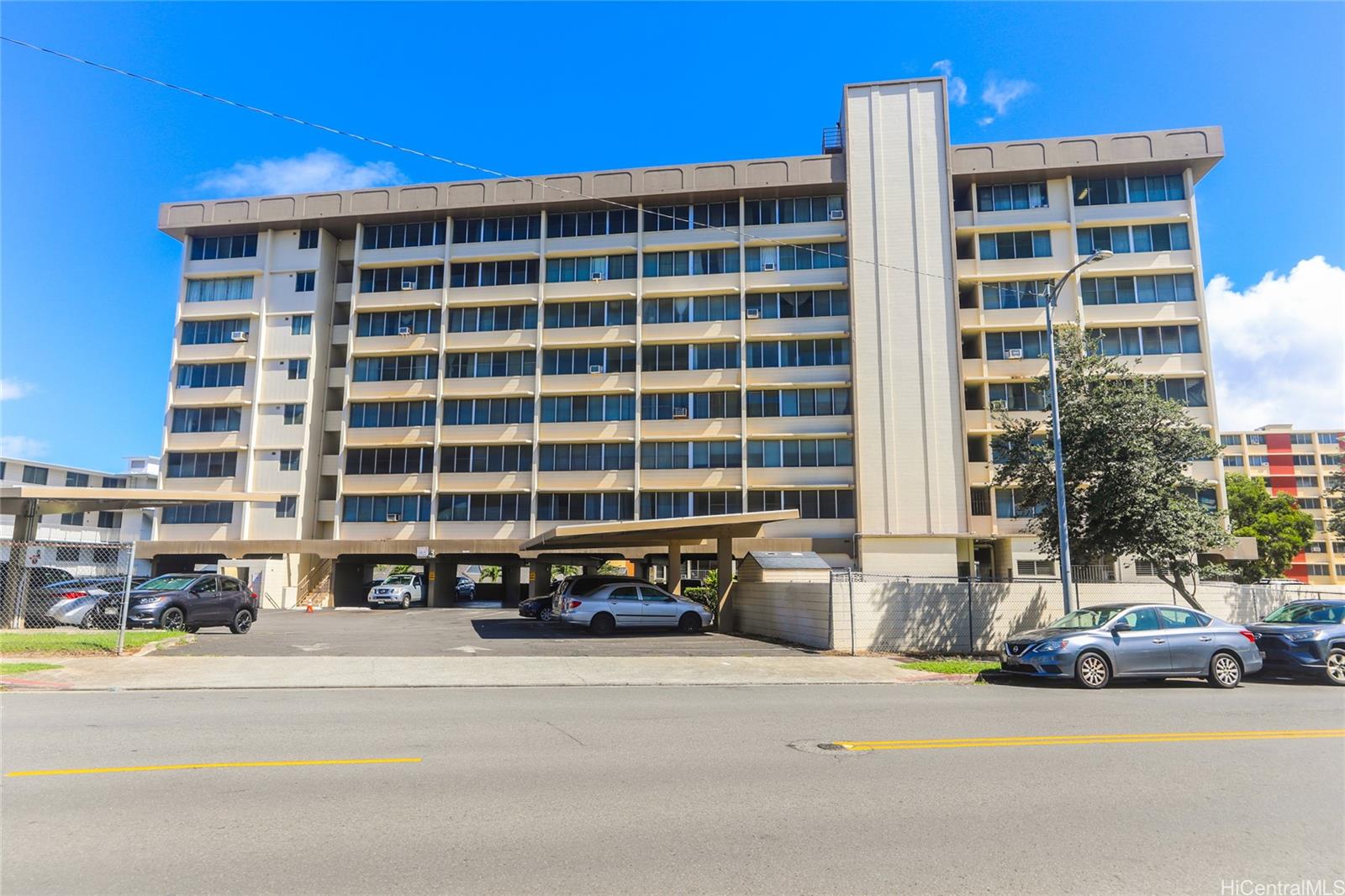 2977 Ala Ilima Street, Unit 610 Honolulu, HI 96818 - Photo 1 of 25 a front view of a building with a street