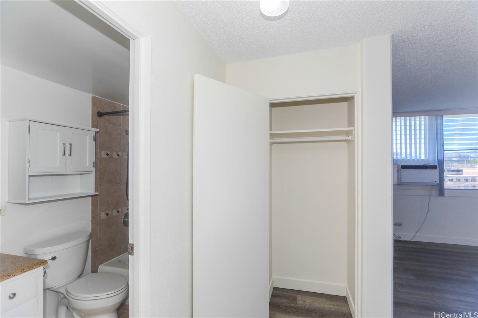 2977 Ala Ilima Street, Unit 610 Honolulu, HI 96818 - Photo 18 of 25 a bathroom with a toilet and a sink