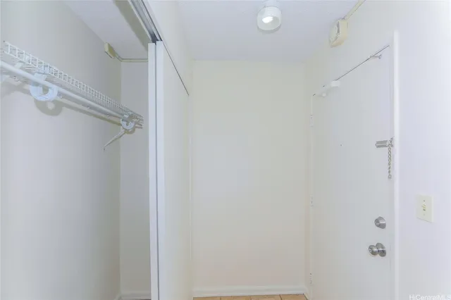 a view of a bathroom from a hallway