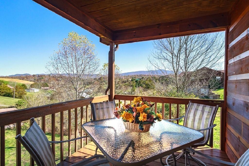 1736 Mountain Ridge Road Newport, TN 37821 - Photo 13 of 18 a view of a dining room with furniture window and outside view