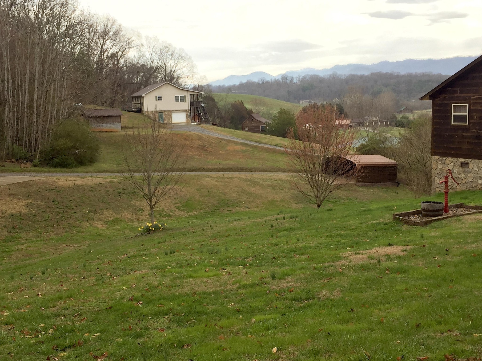 1736 Mountain Ridge Road Newport, TN 37821 - Photo 17 of 18 a view of a town with mountains in the background