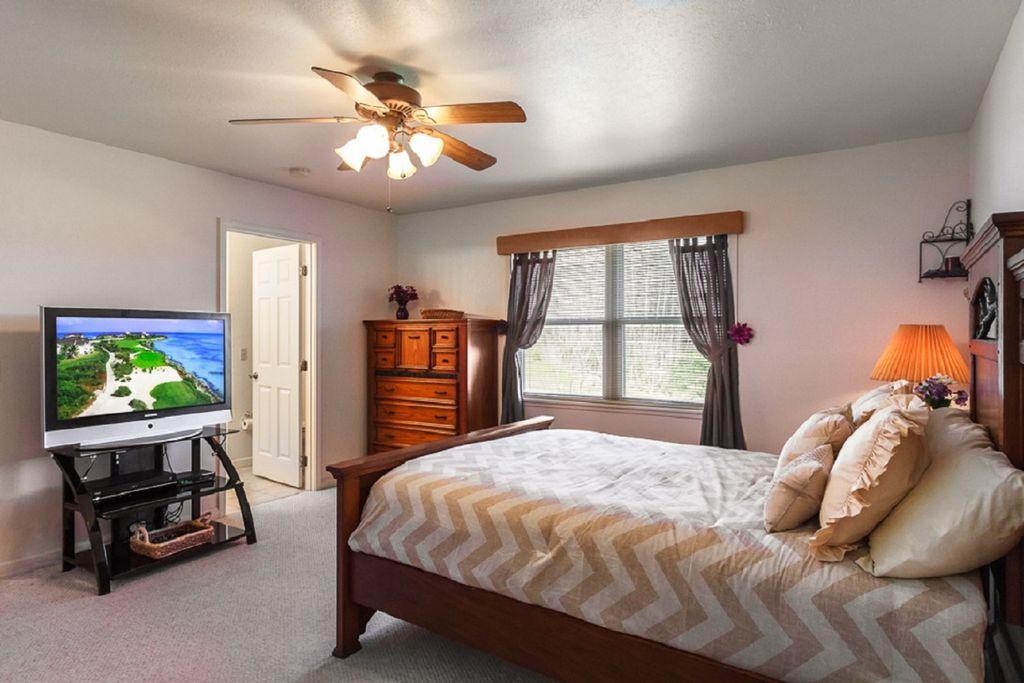 1736 Mountain Ridge Road Newport, TN 37821 - Photo 7 of 18 a bedroom with a bed furniture and a window