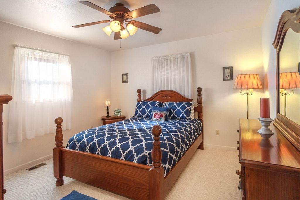 1736 Mountain Ridge Road Newport, TN 37821 - Photo 9 of 18 a bedroom with a bed and window