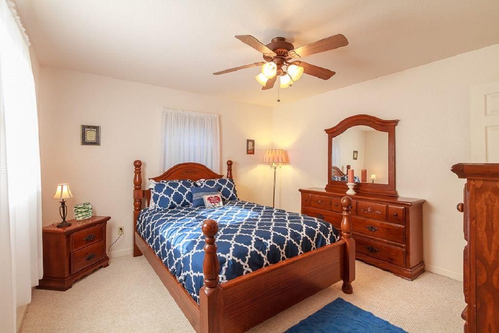 1736 Mountain Ridge Road Newport, TN 37821 - Photo 10 of 18 a bedroom with a bed and wooden floor