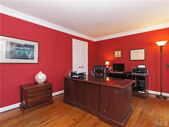 8316 Apple Orchard Way Raleigh, NC 27615 - Photo 10 of 25 Large office with hardwoods, crown and smooth ceilings. This room is located in front of house. Studio/Study/Office