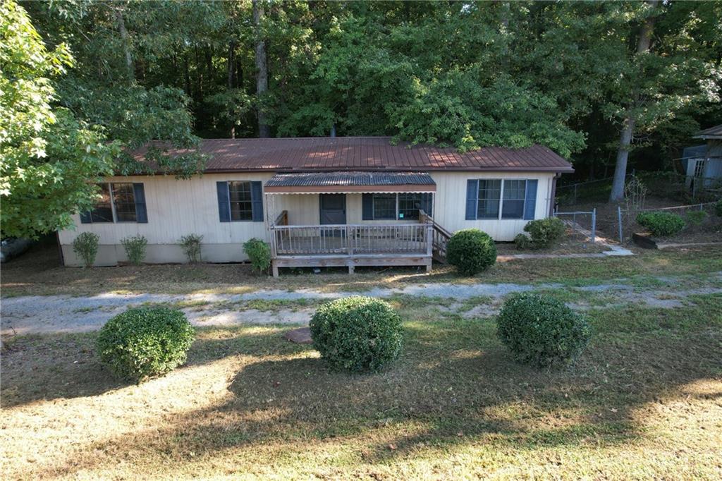3351 Old Atlanta Road Suwanee, GA 30024 - Photo 1 of 1 a front view of a house with garden
