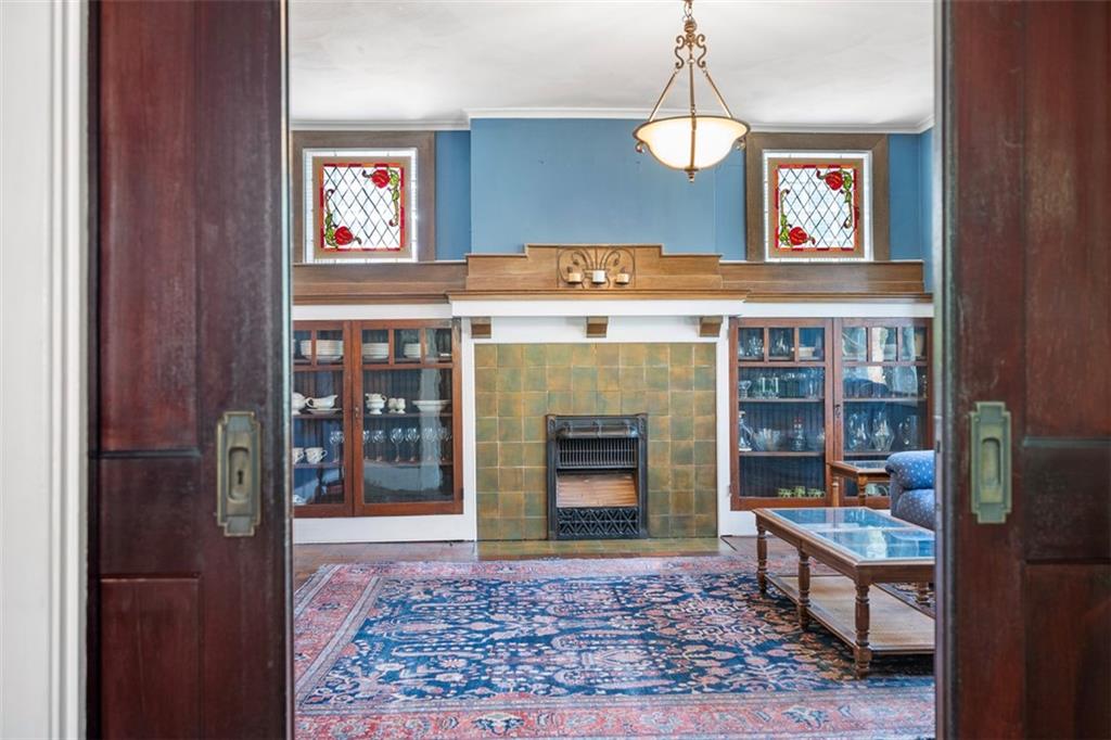 508 Cascade Road Pittsburgh, PA 15221 - Photo 13 of 46 a living room with furniture and a fireplace