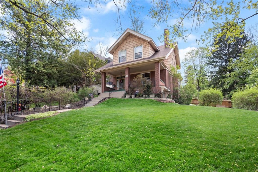 508 Cascade Road Pittsburgh, PA 15221 - Photo 2 of 46 a front view of a house with garden