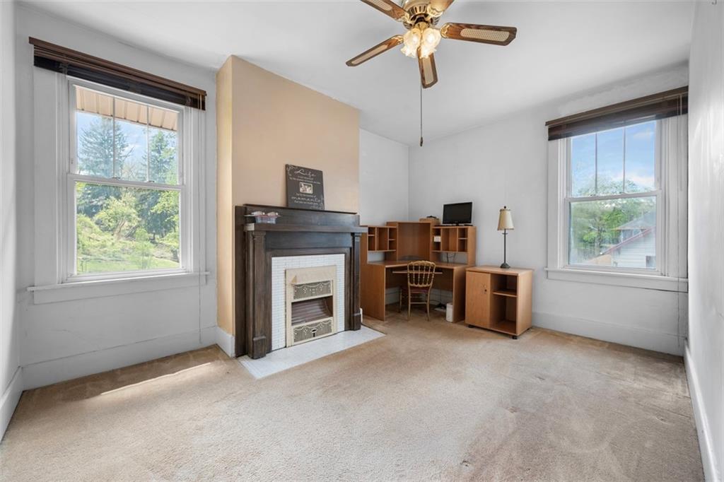 508 Cascade Road Pittsburgh, PA 15221 - Photo 27 of 46 a view of a livingroom with furniture and a ceiling fan
