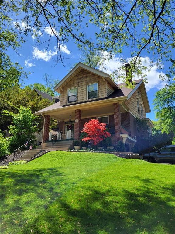 508 Cascade Road Pittsburgh, PA 15221 - Photo 3 of 46 a front view of a house with a yard