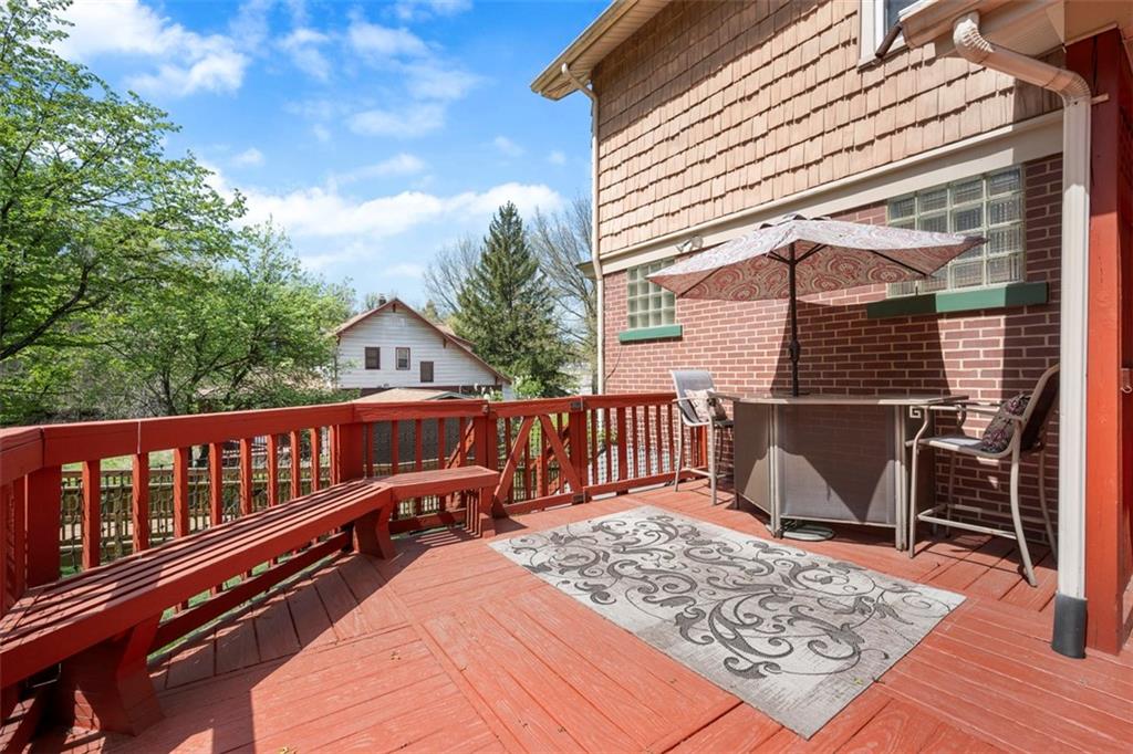 508 Cascade Road Pittsburgh, PA 15221 - Photo 40 of 46 a view of a wooden deck with a bench