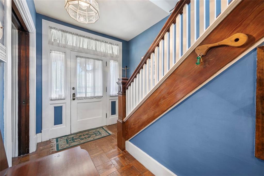 508 Cascade Road Pittsburgh, PA 15221 - Photo 8 of 46 a view of entryway and hall with wooden floor