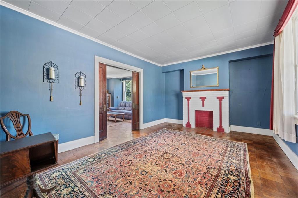 508 Cascade Road Pittsburgh, PA 15221 - Photo 10 of 46 a bedroom with a bed and a dresser