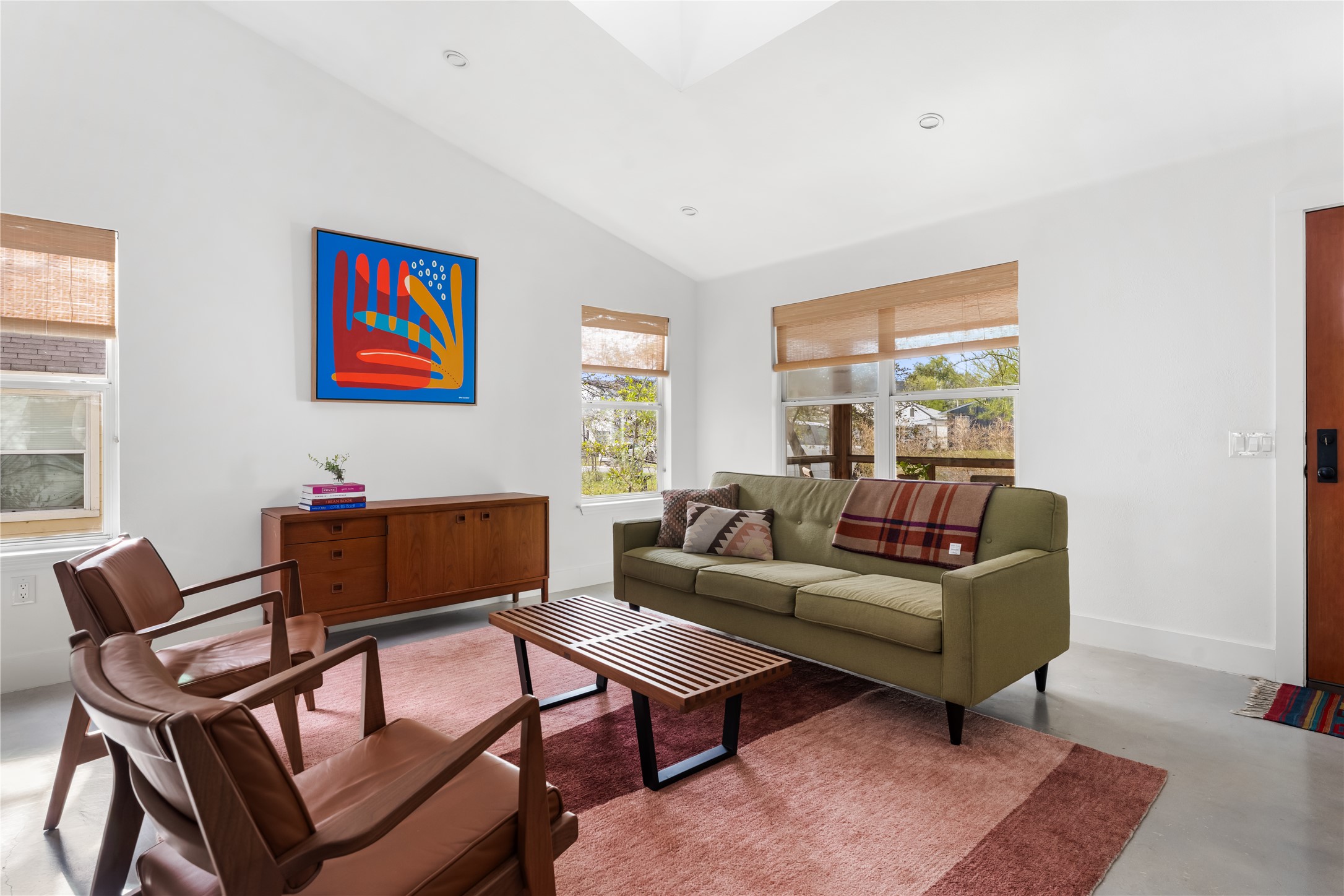 400 Delmar Avenue Austin, TX 78752 - Photo 15 of 36 Bright walls create a versatile backdrop for layering in art and decor