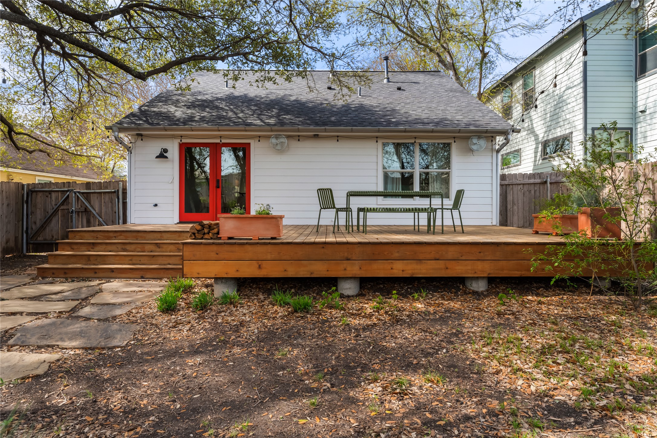 400 Delmar Avenue Austin, TX 78752 - Photo 31 of 36 With its direct connection to the dining area, the deck works naturally for meals outside, whether it’s a quick weeknight dinner or a longer evening spent lingering at the table