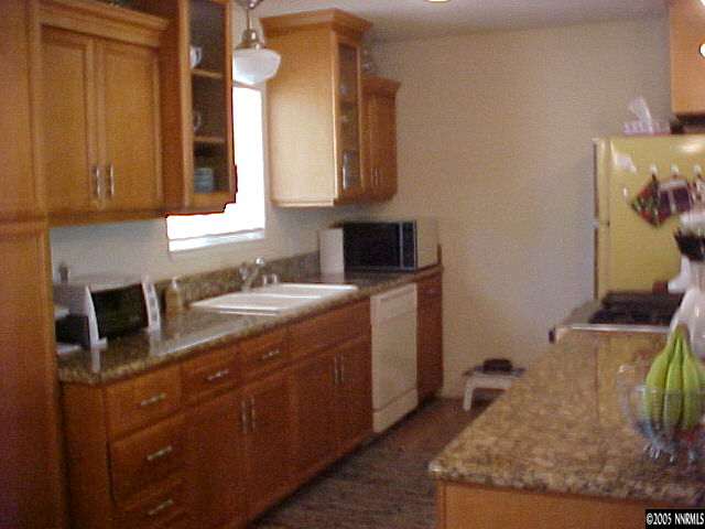 311 Chimney Rock Road Stateline, NV 89449 - Photo 3 of 8 a view of a kitchen with sink dryer and washer