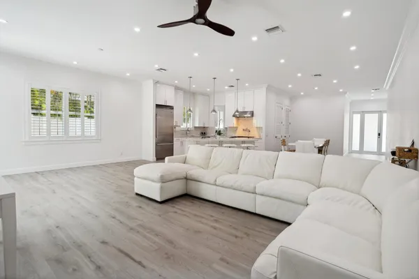 a kitchen with a stove and a sink