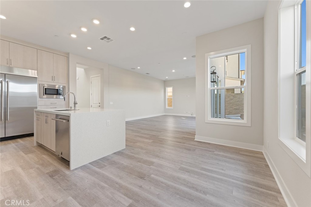 181 Hollyleaf Lake Forest, CA 92630 - Photo 11 of 36 a view of kitchen with windows and refrigerator