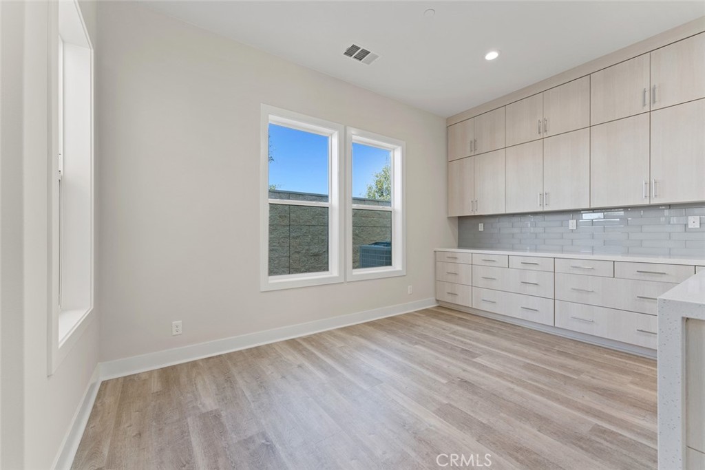 181 Hollyleaf Lake Forest, CA 92630 - Photo 12 of 36 a view of an empty room with a window