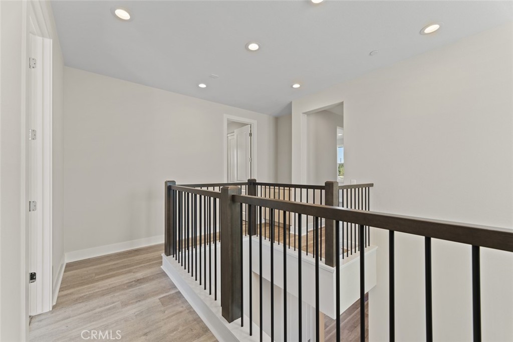 181 Hollyleaf Lake Forest, CA 92630 - Photo 19 of 36 a view of a hallway with wooden floor and entryway