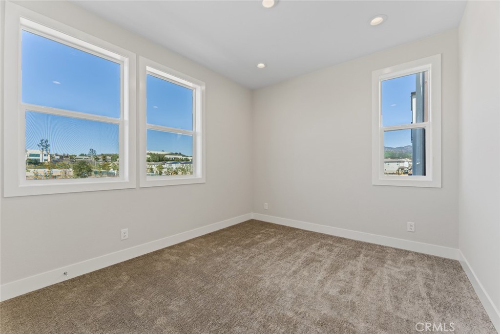 181 Hollyleaf Lake Forest, CA 92630 - Photo 32 of 36 an empty room with windows